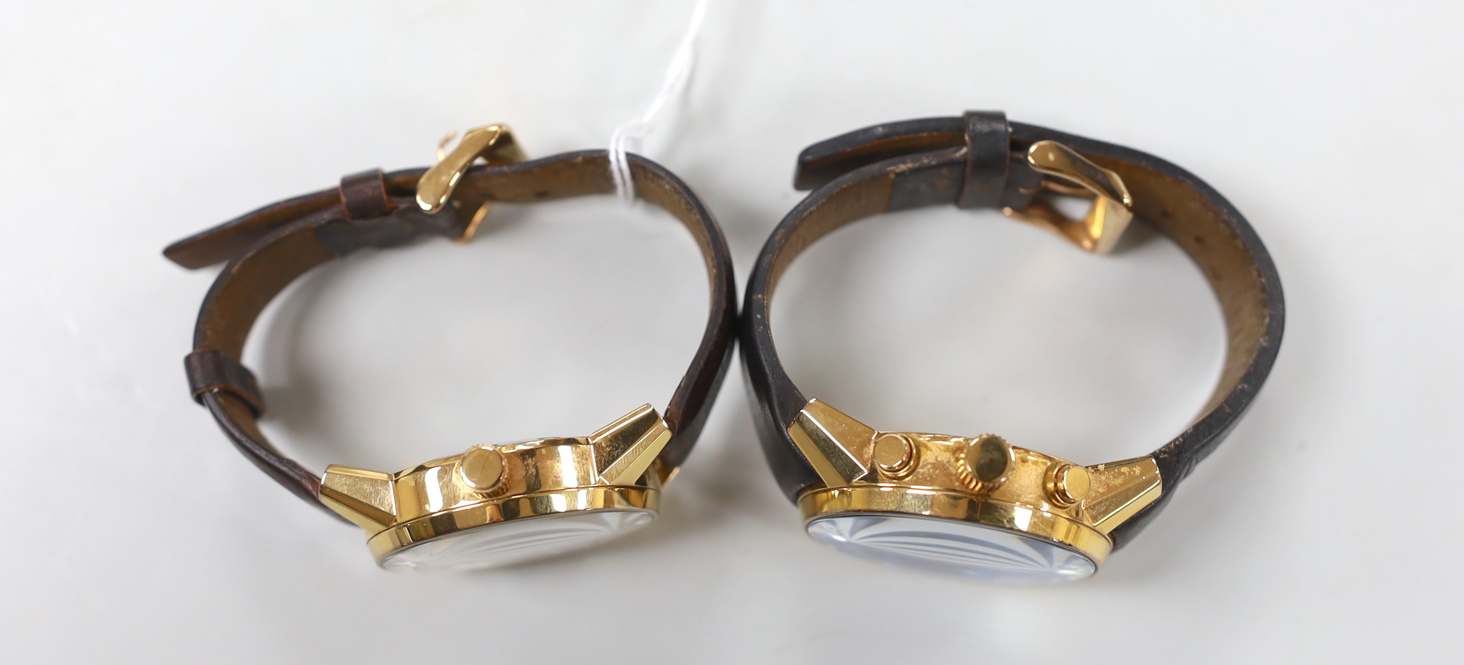 A gentleman's modern gilt metal Vostok Europe Perpetual Calendar wrist watch and a similar Limousine Gaz-4 wrist watch.